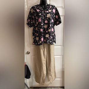 XL black Scrub HQ scrub top with tan and pink flowers -Dickies XLT scrub pants.